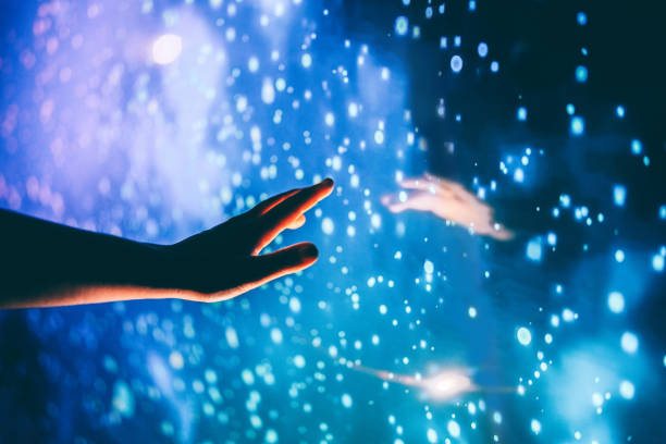 human hand reaching toward the dark unknown